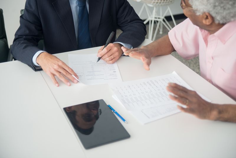 Financial advisor consulting with SMB business owner